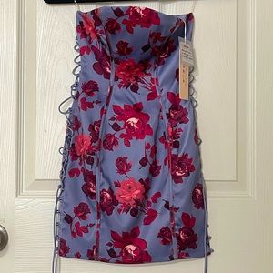 OH POLLY MINI DRESS WITH FLOWERS AND OPEN SIDES